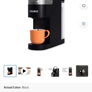 Keurig Black Coffee Maker with Orange Mug